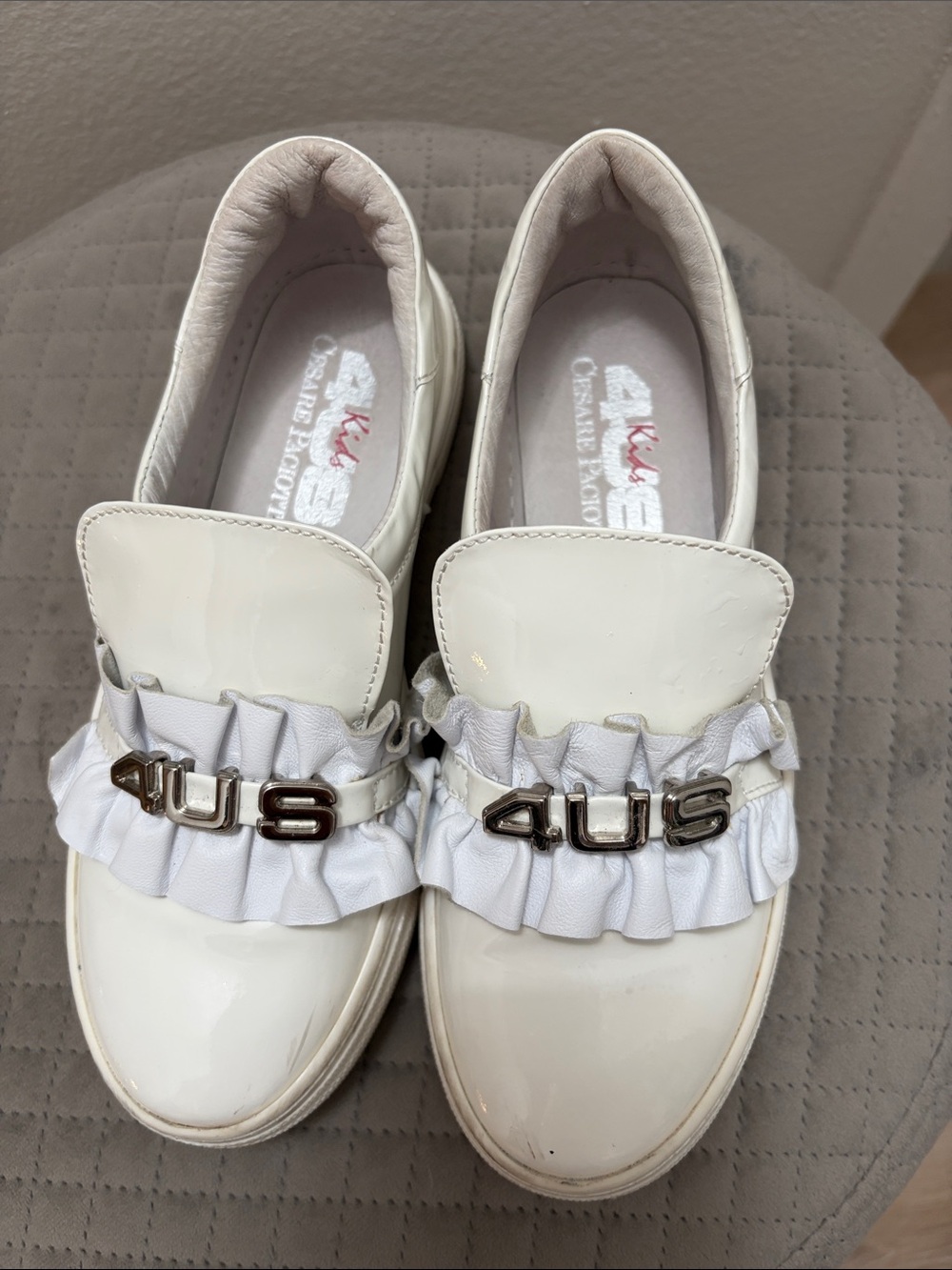 Cesare Paciotti White Patent Leather Slip-Ons with Ruffle Detail